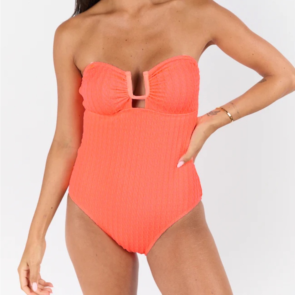Never worn! Coral bandeau style one piece bathing suit with adjustable straps